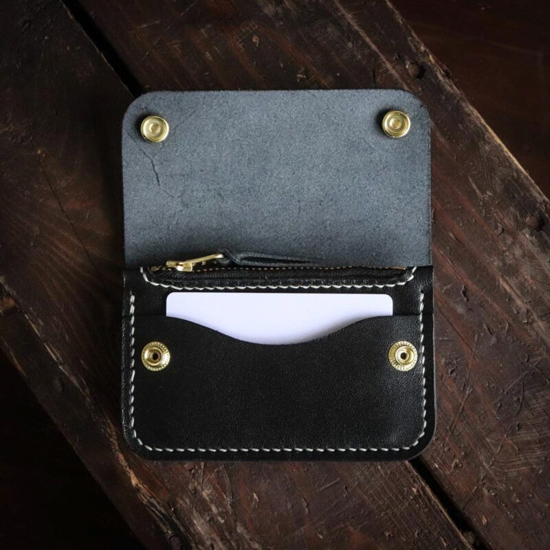 Leather trucker wallet black with card open
